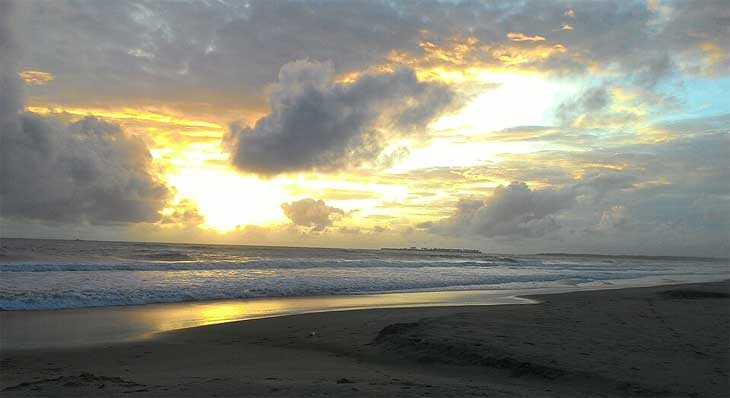 South Goa beach at golden hour sunset — quiet romantic beach for honeymooners in India
