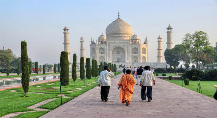 Budget Golden Triangle tour group at Taj Mahal gate, Agra India — affordable India packages