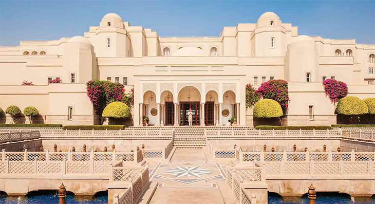 Luxury hotel pool with Taj Mahal view at Oberoi Amarvilas Agra — premium Golden Triangle India package
