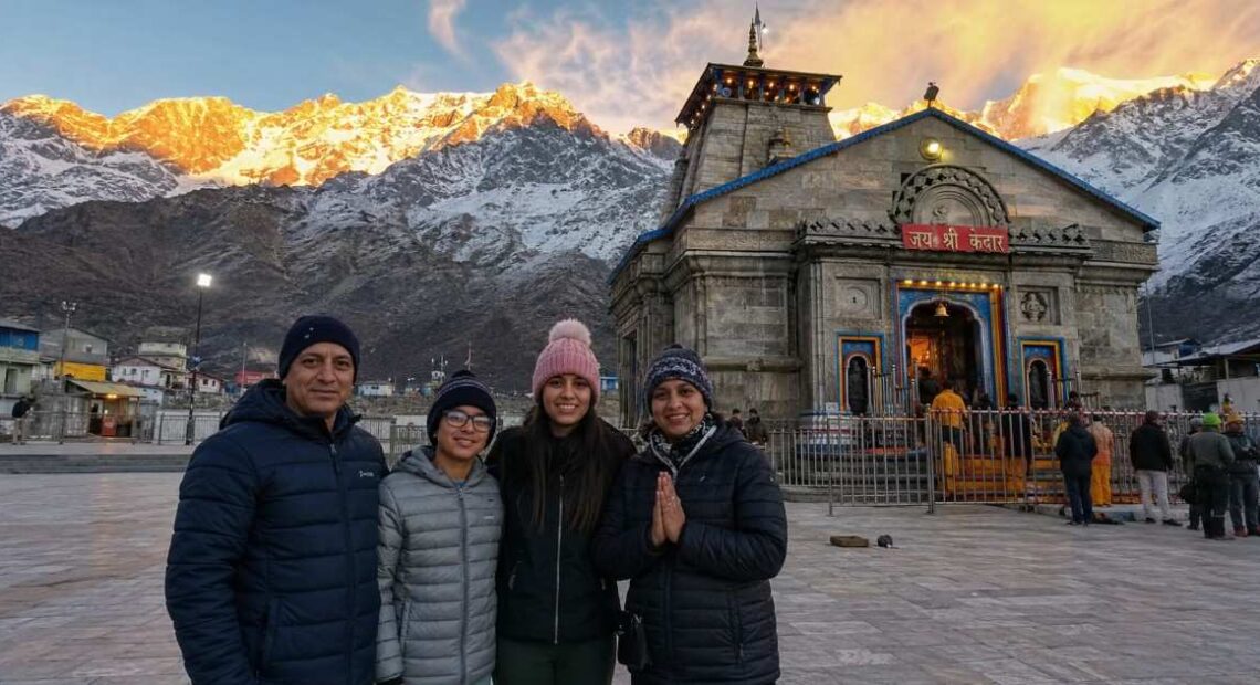 NRI family standing in front of Kedarnath temple during Char Dham Yatra 2026, Uttarakhand, India