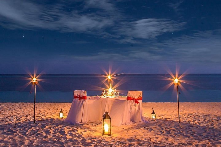 Romantic candlelight dinner on a beach in Goa
