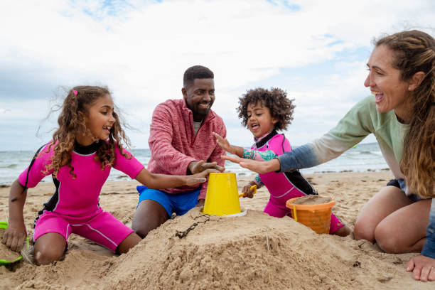 Family enjoying a beach vacation in Goa with children