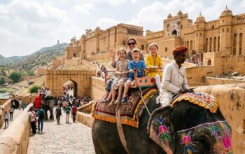 Children enjoying an elephant ride at Amber Fort, a Golden Triangle family tour highlight