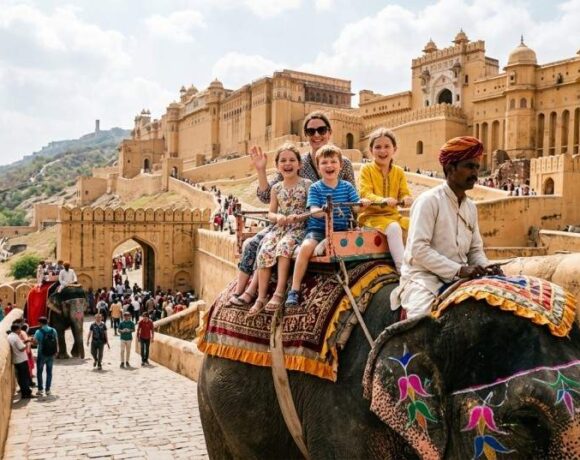 Children enjoying an elephant ride at Amber Fort, a Golden Triangle family tour highlight