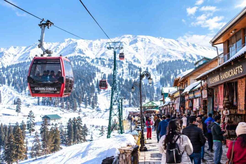 Tourists riding the Gulmarg Gondola cable car in 2026