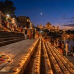 Glowing clay diyas and marigold garlands lit at dusk during Diwali celebrations in India